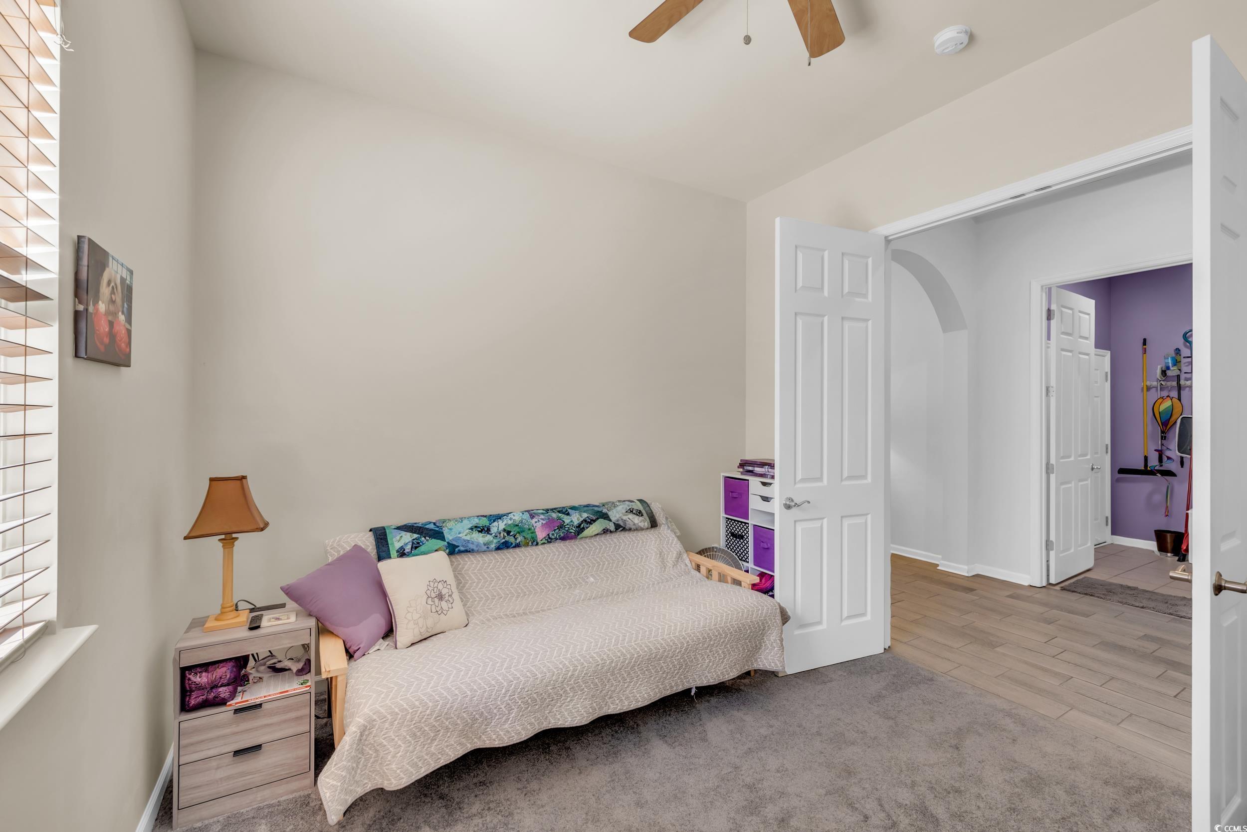 138 Sugar Loaf Lane Murrells Inlet, SC 29576 - Photo 12 of 38 Living area with baseboards, wood finished floors,