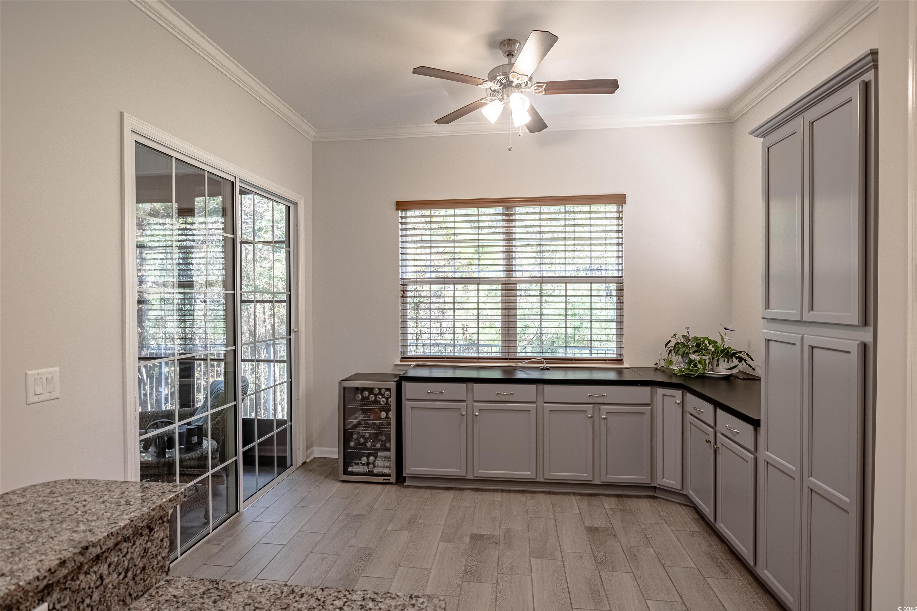 138 Sugar Loaf Lane Murrells Inlet, SC 29576 - Photo 23 of 38 Kitchen with gray cabinets, light hardwood / wood-