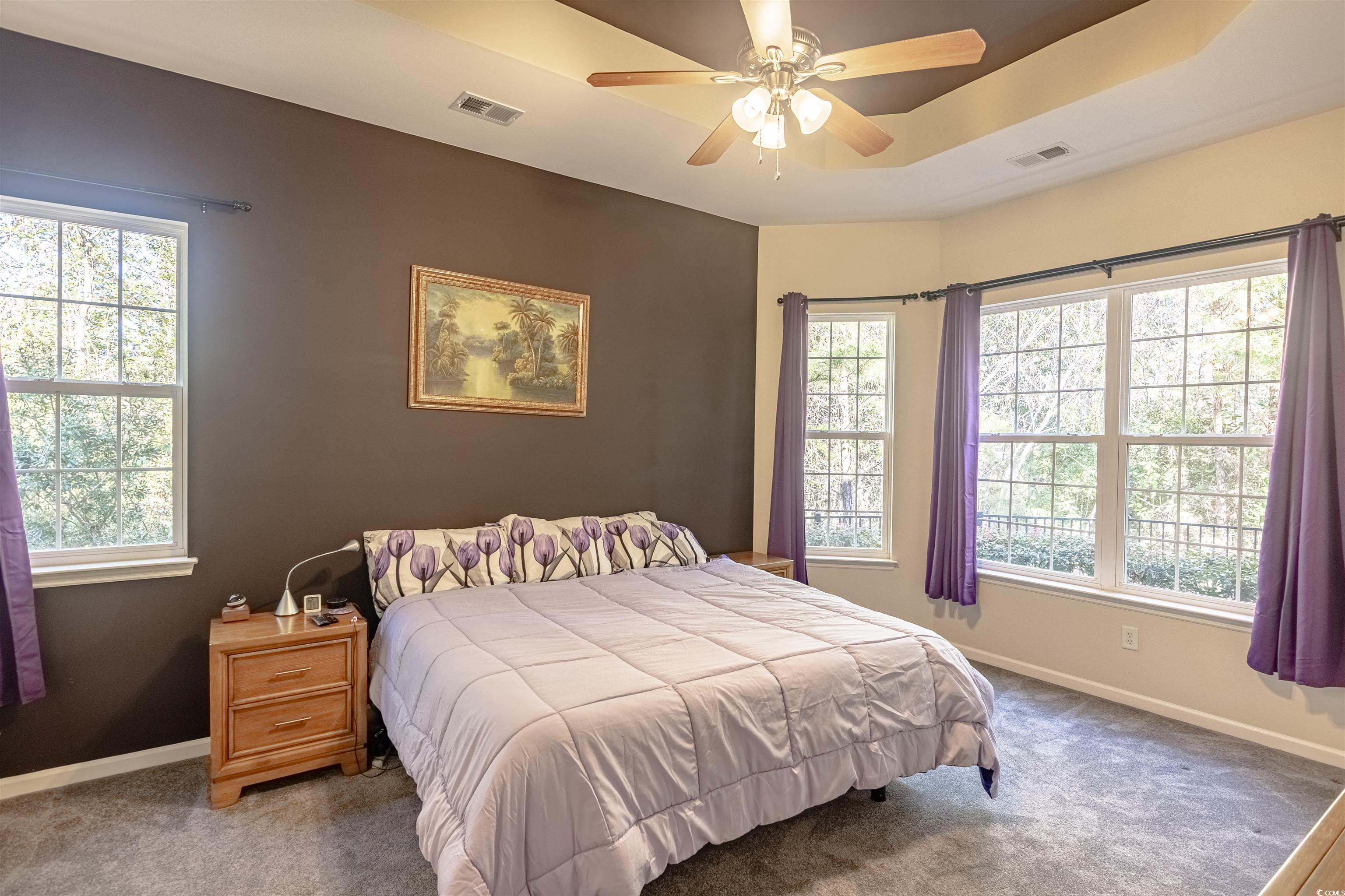 138 Sugar Loaf Lane Murrells Inlet, SC 29576 - Photo 24 of 38 Carpeted bedroom featuring ceiling fan