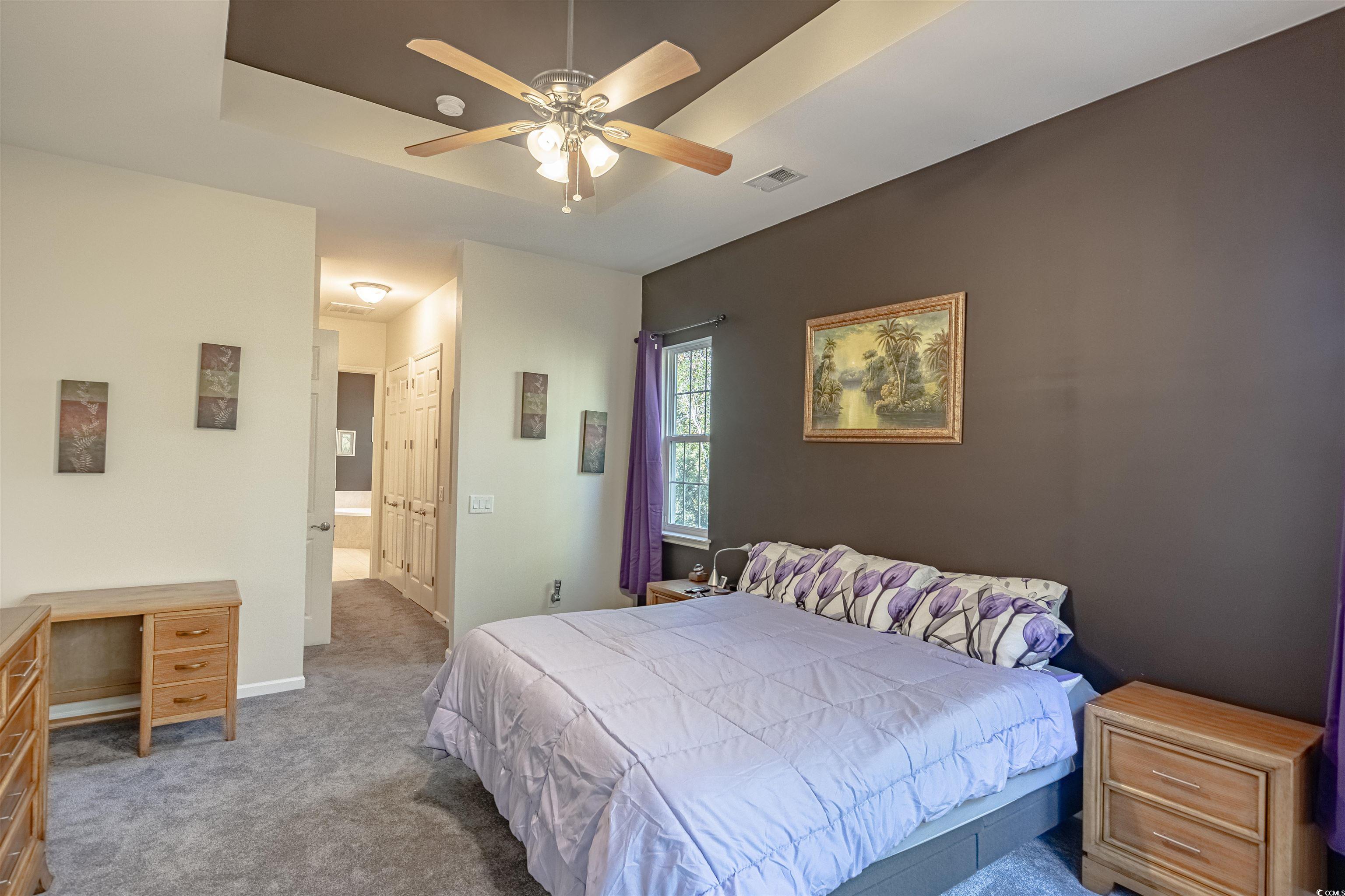 138 Sugar Loaf Lane Murrells Inlet, SC 29576 - Photo 25 of 38 Carpeted bedroom with ceiling fan and a closet