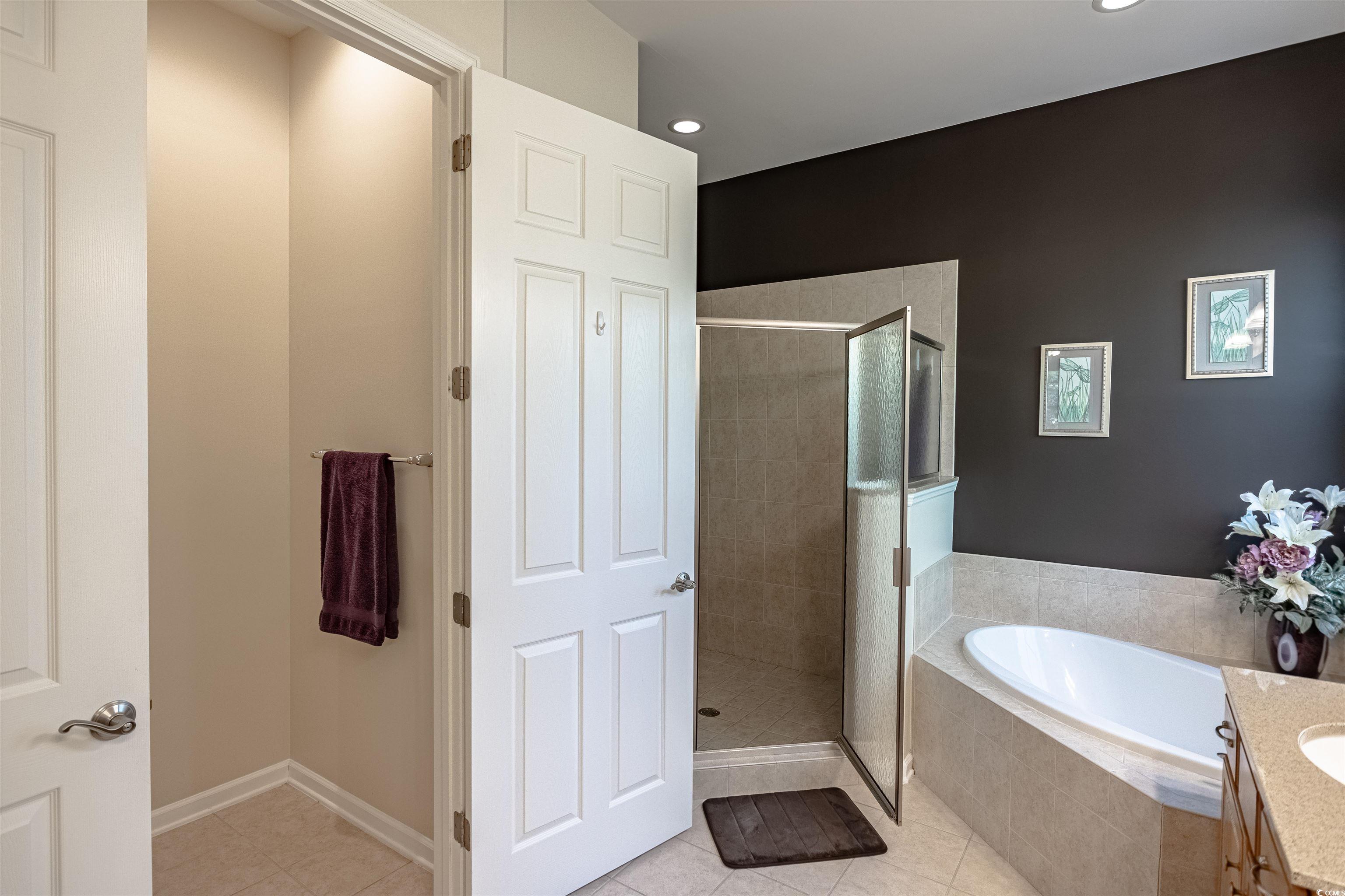 138 Sugar Loaf Lane Murrells Inlet, SC 29576 - Photo 29 of 38 Bathroom featuring tile patterned flooring, vanity