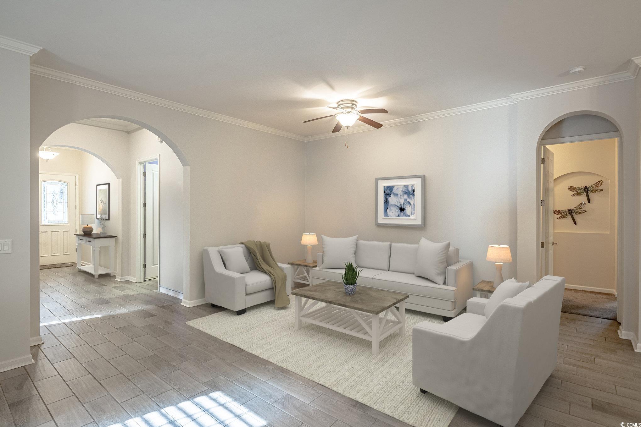 138 Sugar Loaf Lane Murrells Inlet, SC 29576 - Photo 5 of 38 Living area featuring a ceiling fan, wood finish f