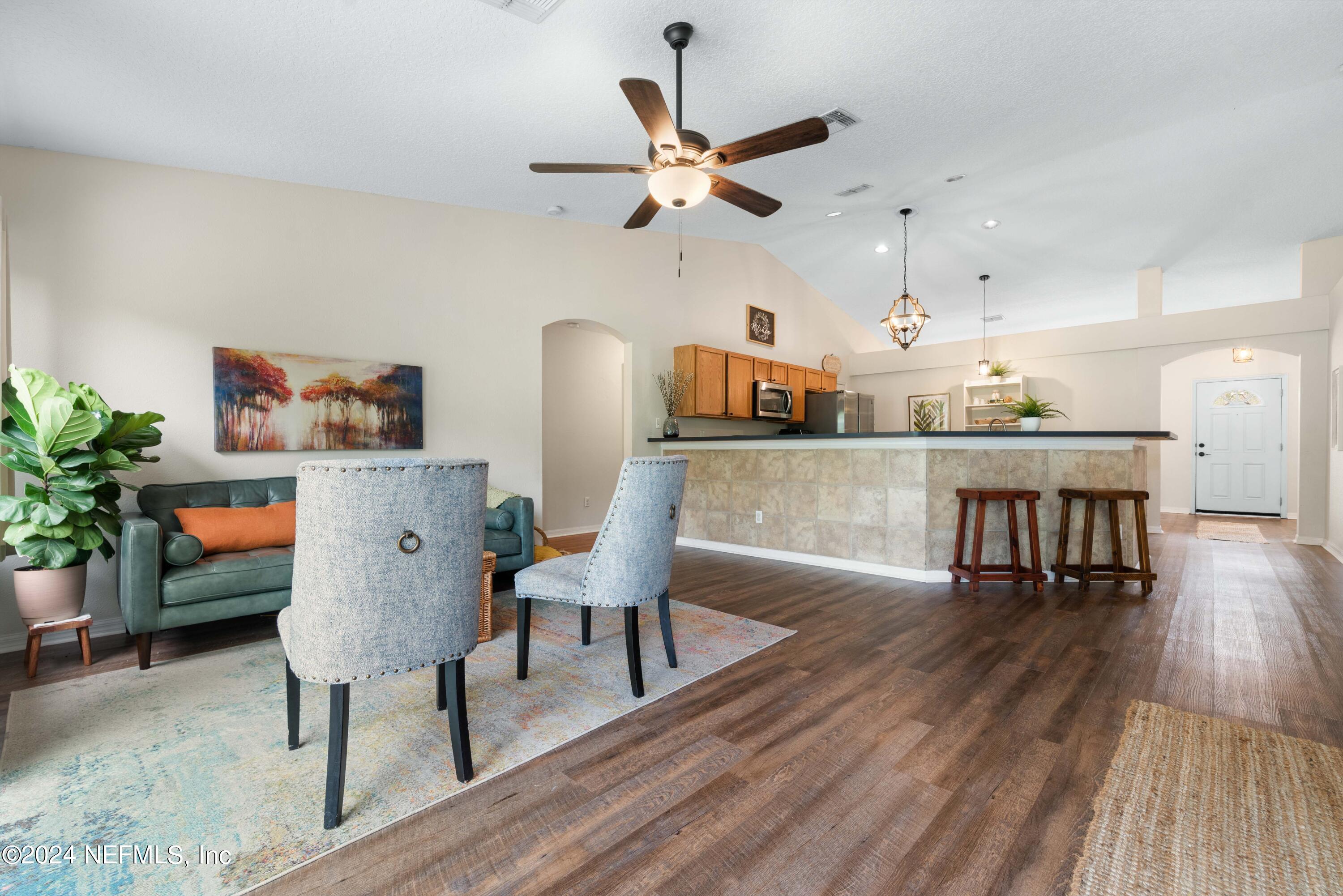 968 Deer Spring Drive Jacksonville, FL 32221 - Photo 11 of 31 a living room with furniture and wooden floor
