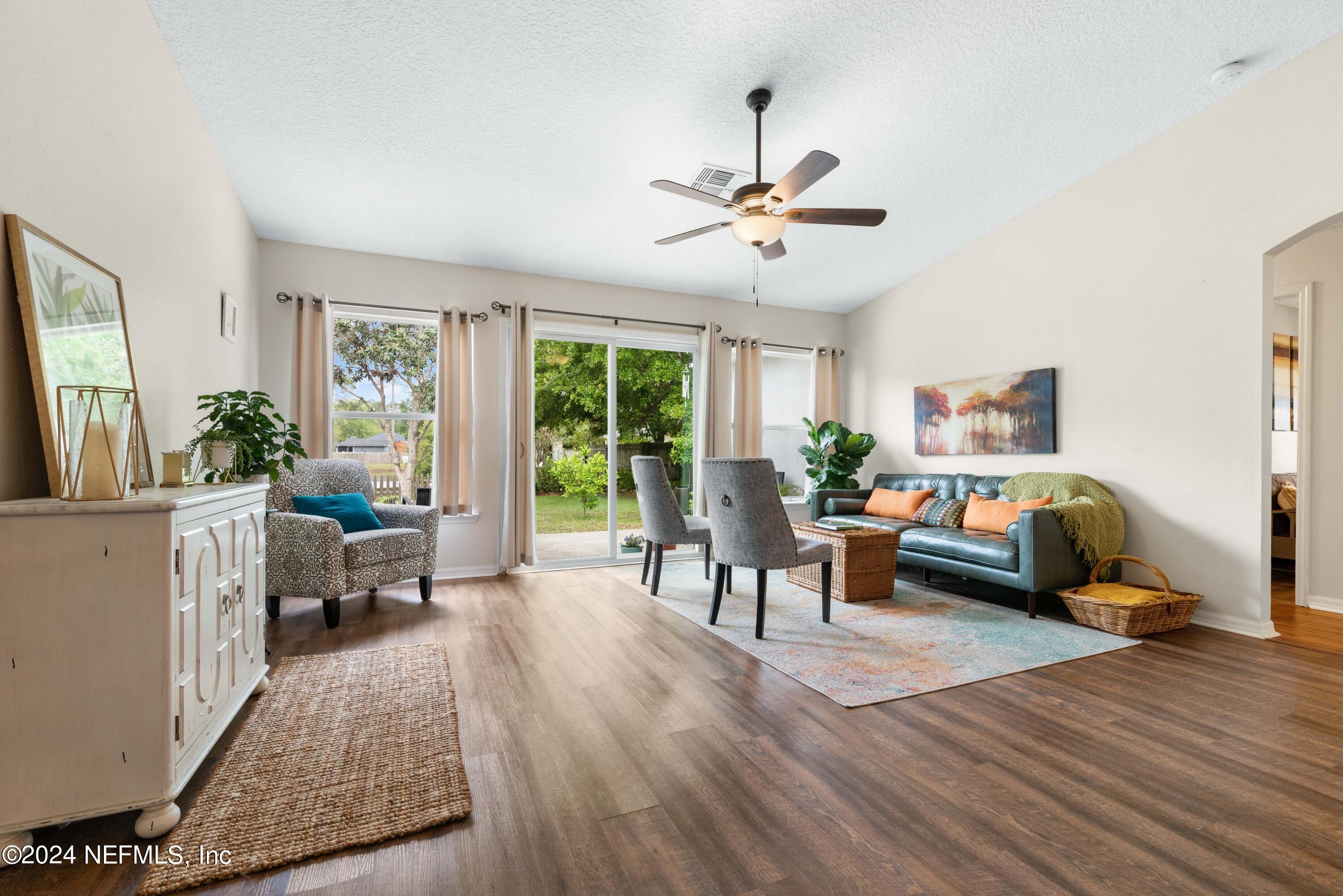 968 Deer Spring Drive Jacksonville, FL 32221 - Photo 13 of 31 a living room with furniture and a large window