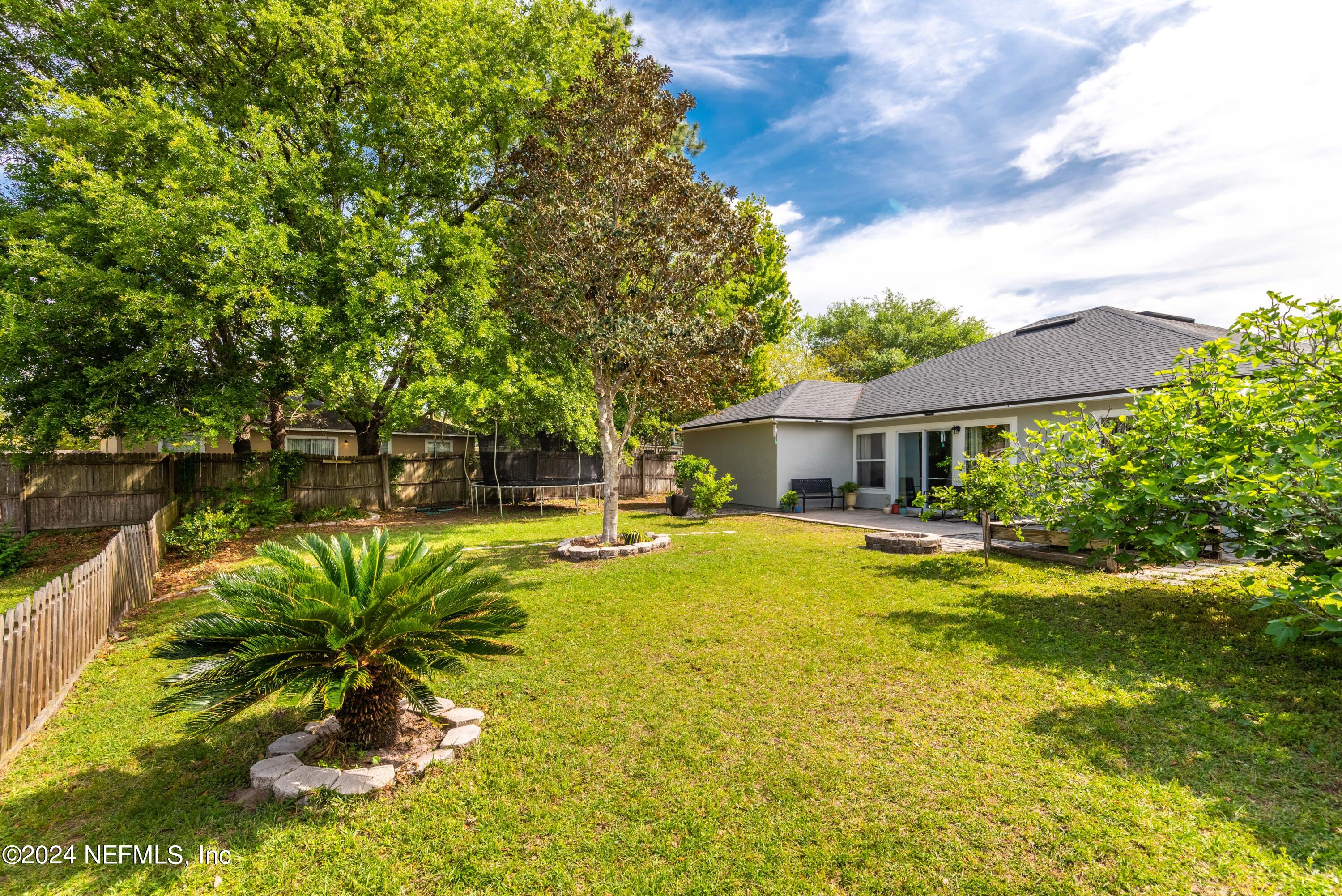 968 Deer Spring Drive Jacksonville, FL 32221 - Photo 27 of 31 a view of a house with pool and sitting area