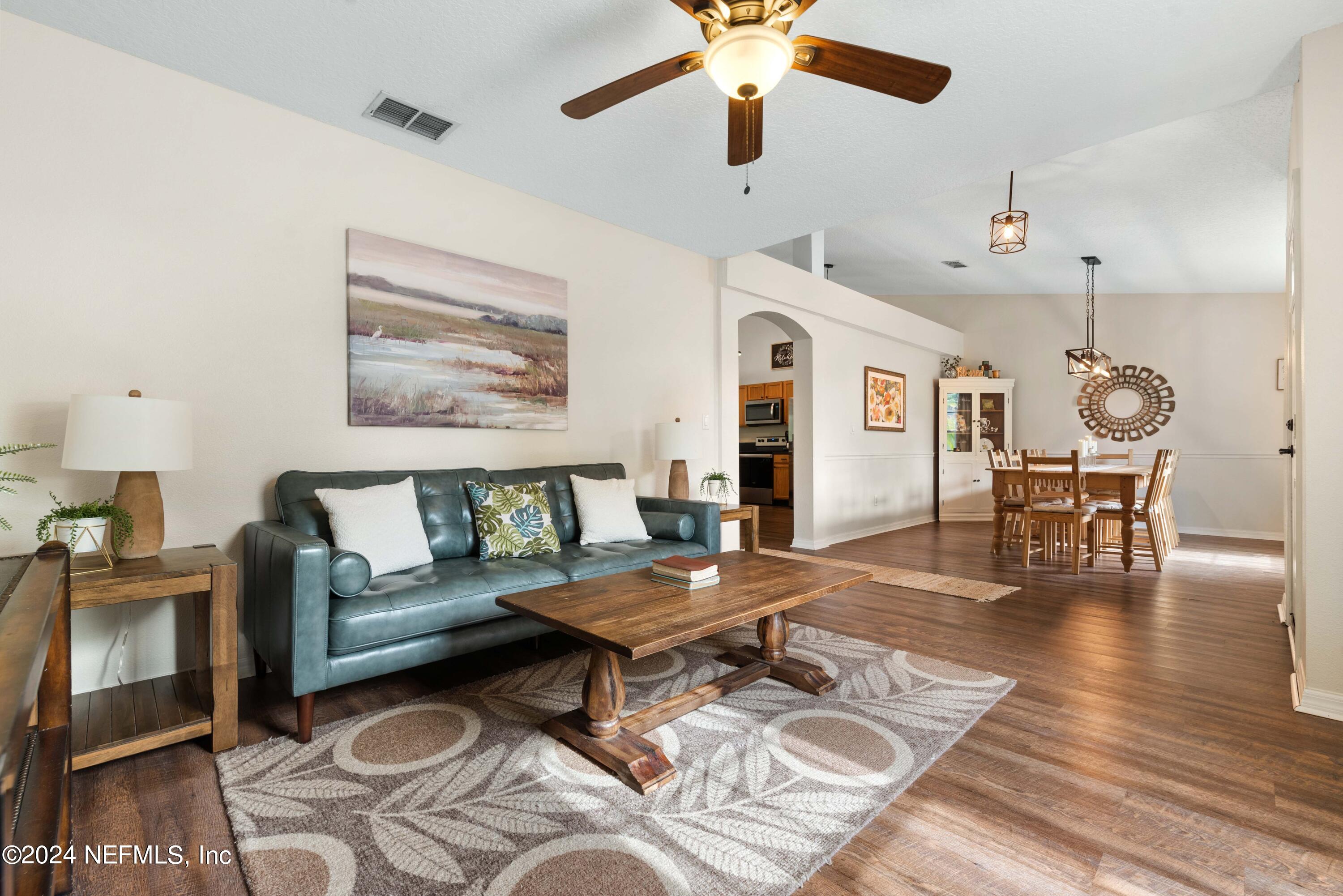 968 Deer Spring Drive Jacksonville, FL 32221 - Photo 4 of 31 a living room with furniture and wooden floor