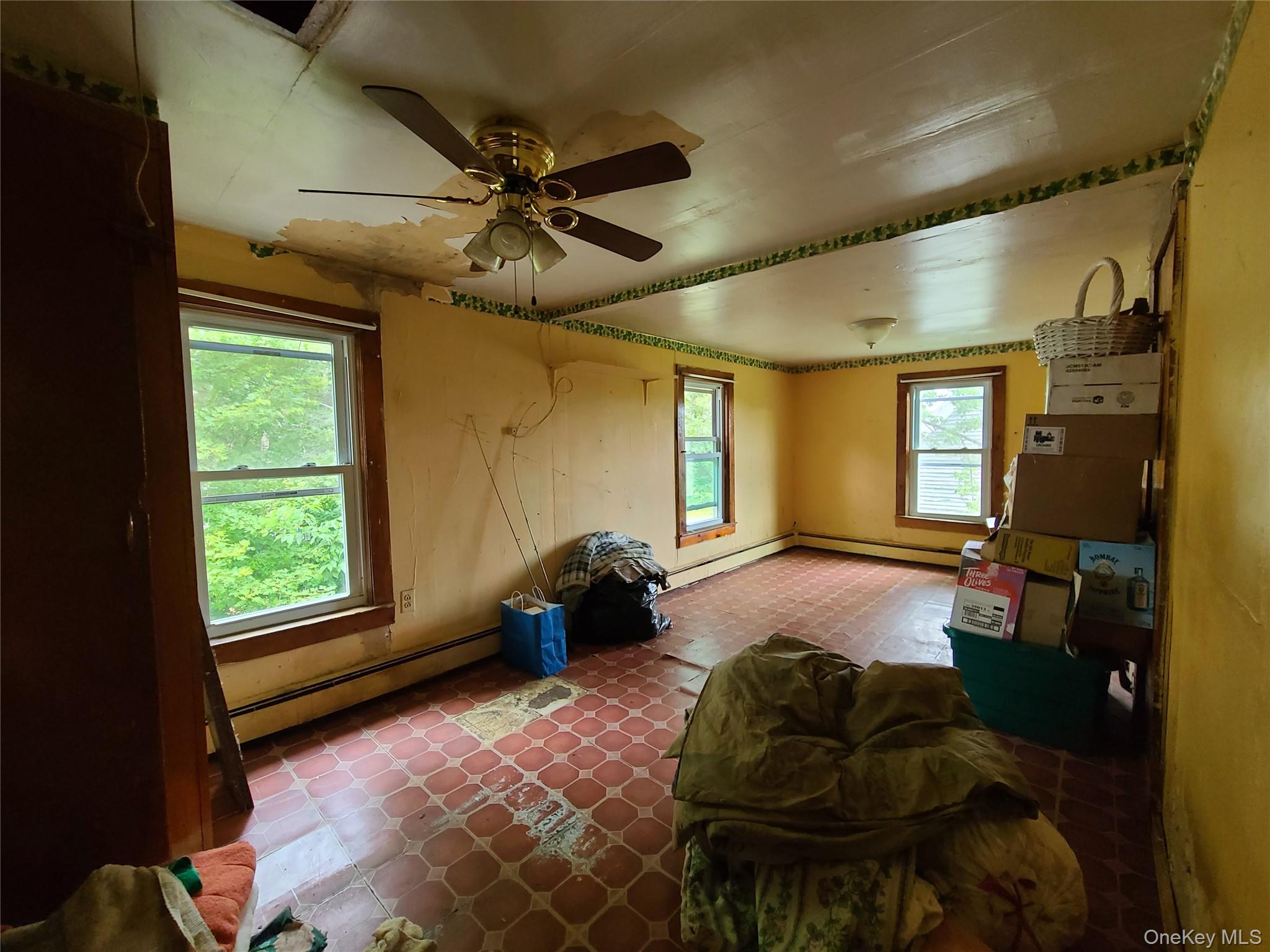 299-301 Stump Pond Road Livingston Manor, NY 12758 - Photo 21 of 50 a living room with furniture and a window