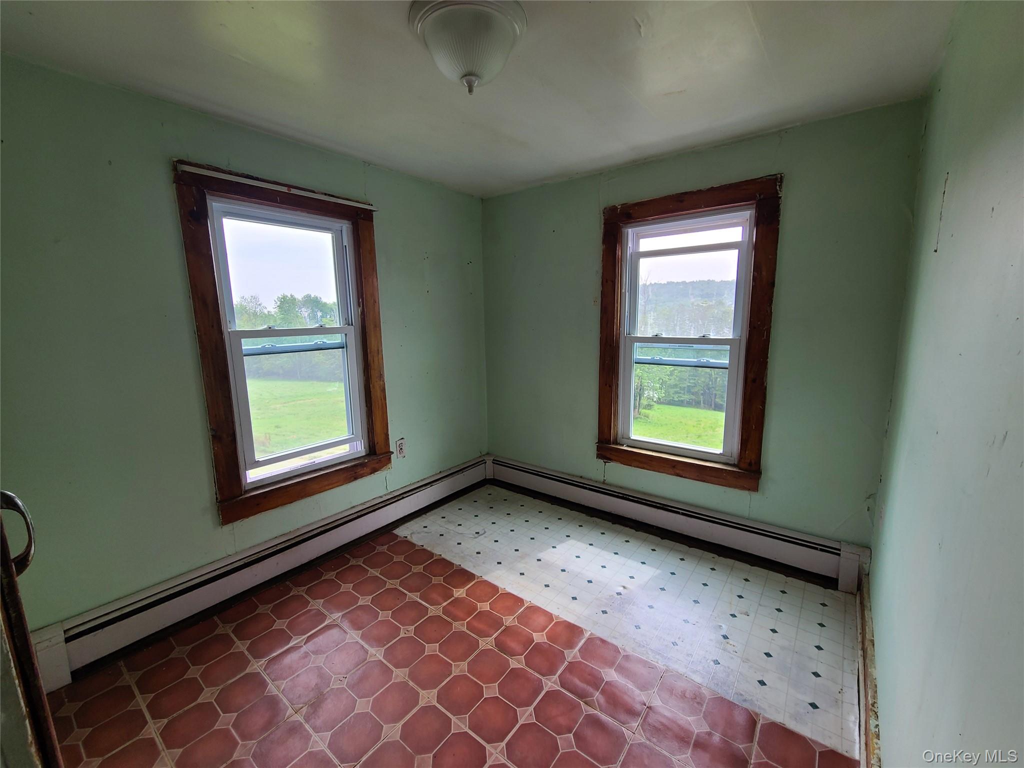 299-301 Stump Pond Road Livingston Manor, NY 12758 - Photo 23 of 50 a view of an empty room with a window