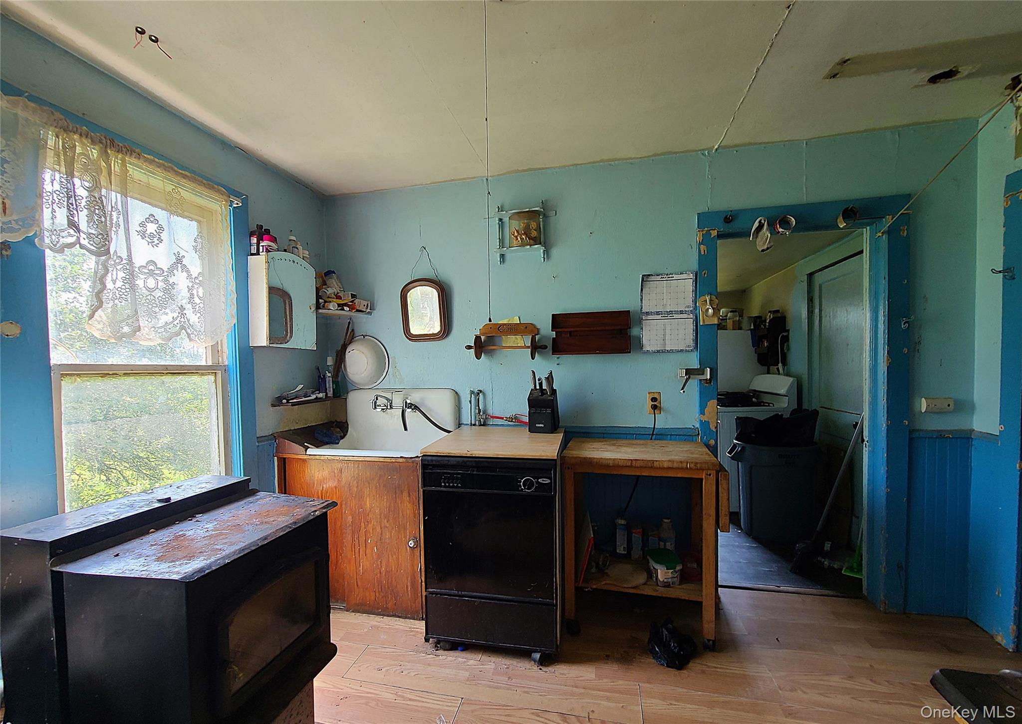 299-301 Stump Pond Road Livingston Manor, NY 12758 - Photo 31 of 50 a room with furniture and a window