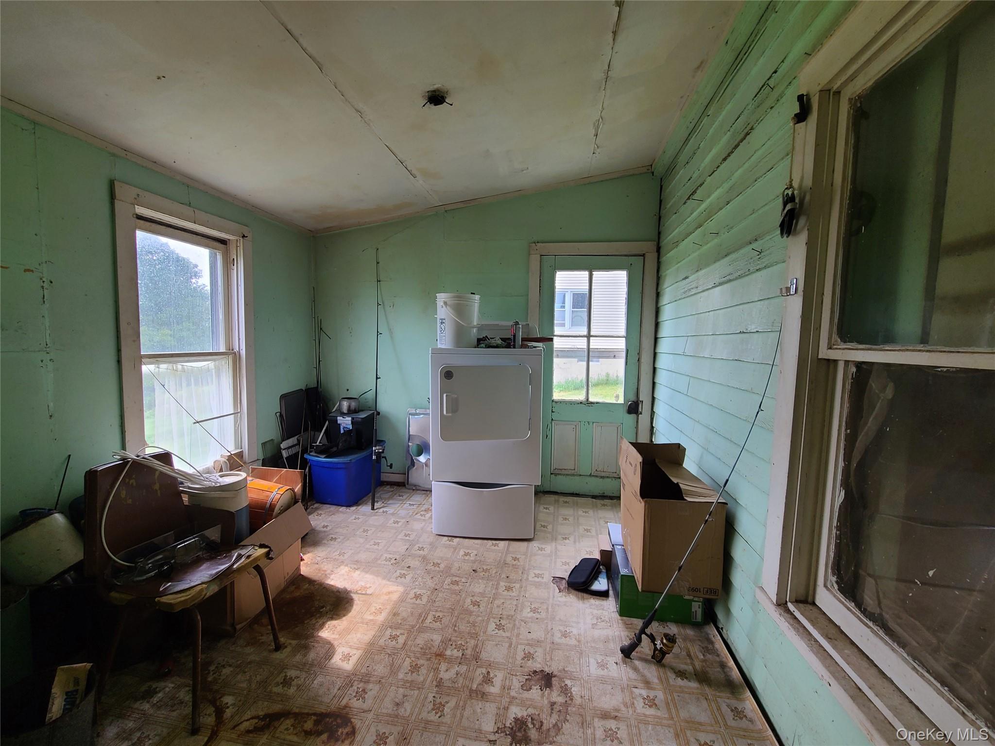 299-301 Stump Pond Road Livingston Manor, NY 12758 - Photo 35 of 50 a room with furniture and a window