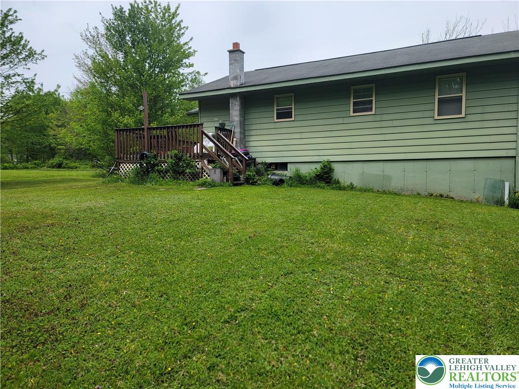 320 Hillside Street Forest City, PA 18421 - Photo 3 of 24 a front view of a house with garden
