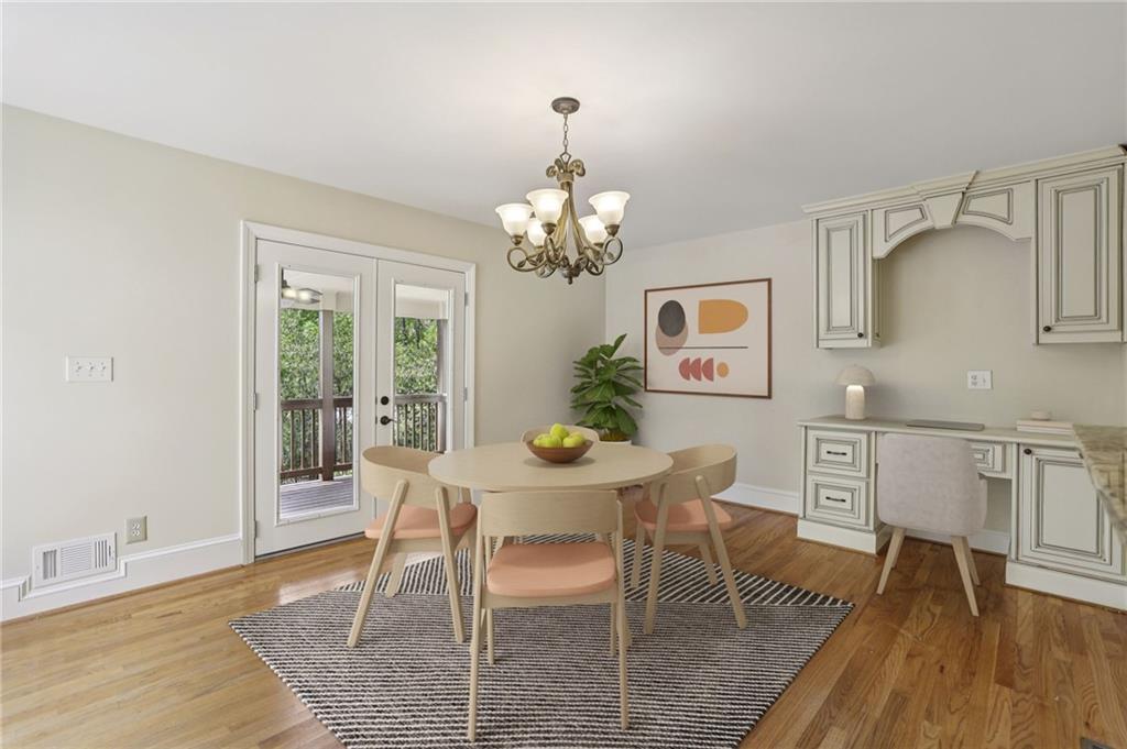 1843 Vancroft Court Atlanta, GA 30338 - Photo 13 of 46 a view of a dining room with furniture and wooden floor