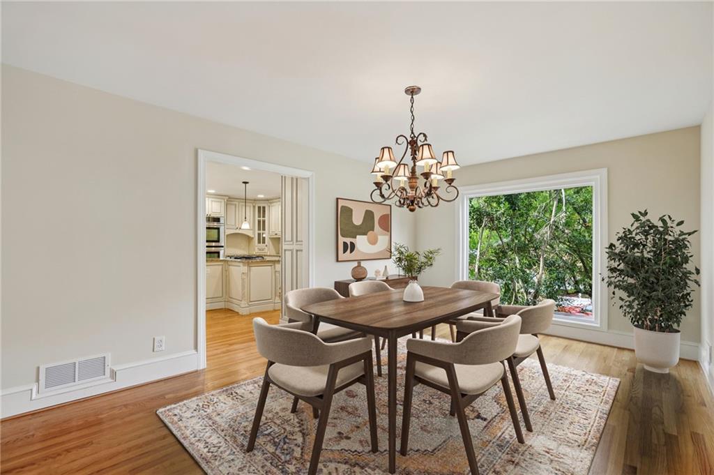 1843 Vancroft Court Atlanta, GA 30338 - Photo 17 of 46 a view of a dining room with furniture window and wooden floor