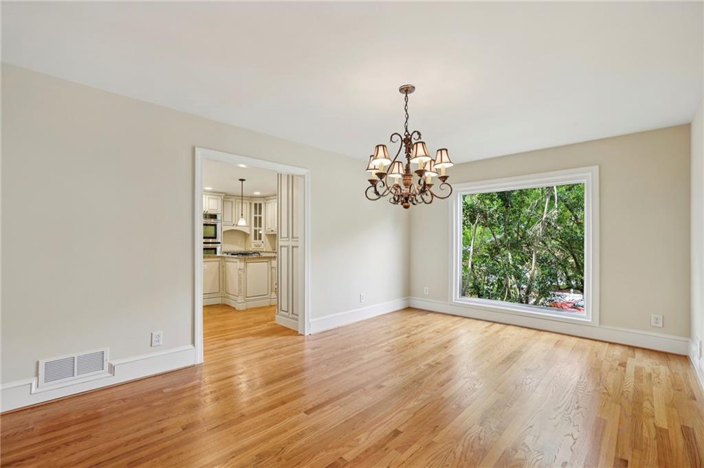 1843 Vancroft Court Atlanta, GA 30338 - Photo 18 of 46 a view of a room with a window and wooden floor
