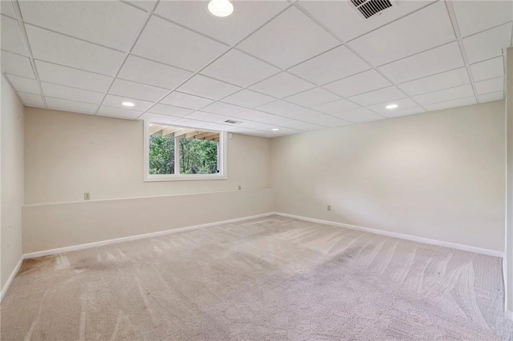 1843 Vancroft Court Atlanta, GA 30338 - Photo 33 of 46 a view of an empty room with a window