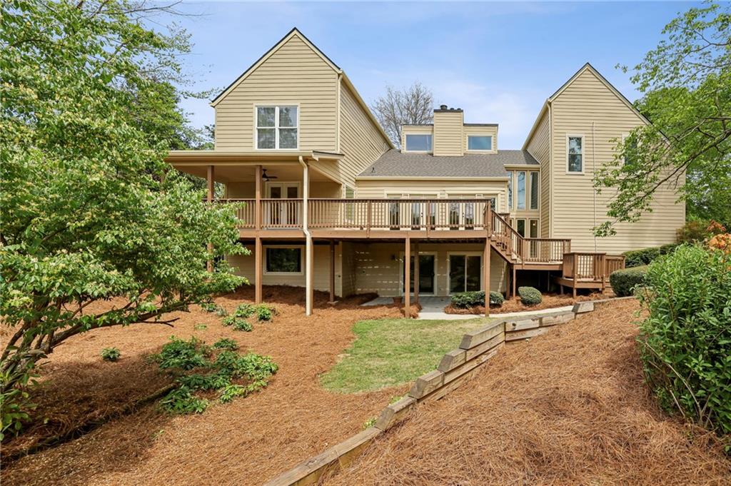 1843 Vancroft Court Atlanta, GA 30338 - Photo 39 of 46 a front view of a house with a yard