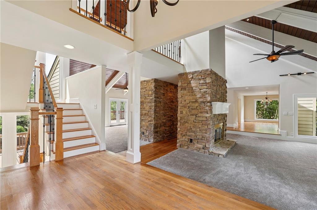 1843 Vancroft Court Atlanta, GA 30338 - Photo 4 of 46 a view of a livingroom with wooden floor and stairs