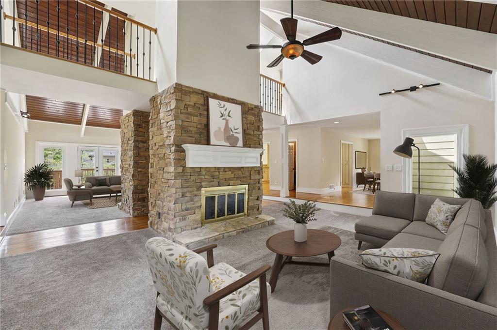 1843 Vancroft Court Atlanta, GA 30338 - Photo 5 of 46 a living room with furniture and a fireplace