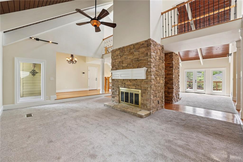 1843 Vancroft Court Atlanta, GA 30338 - Photo 7 of 46 a view of a livingroom with a fireplace and window