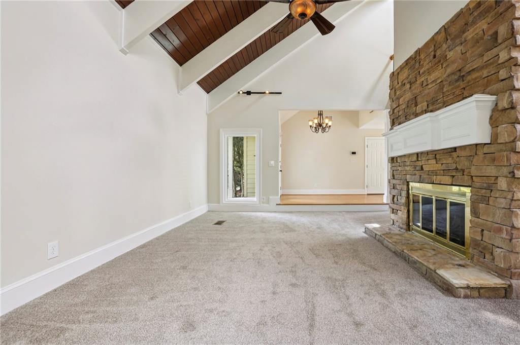 1843 Vancroft Court Atlanta, GA 30338 - Photo 8 of 46 a view of a livingroom with a fireplace