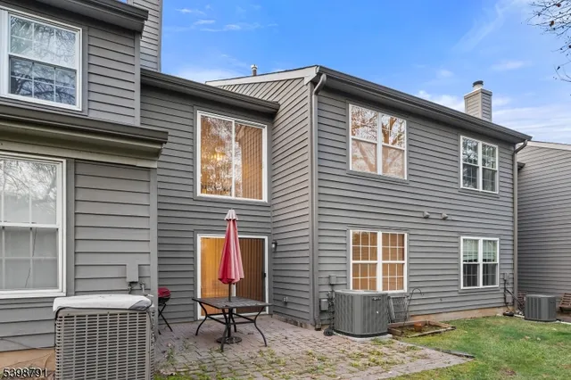 a backyard of a house with seating space