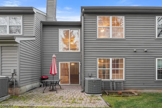 a front view of a house with patio