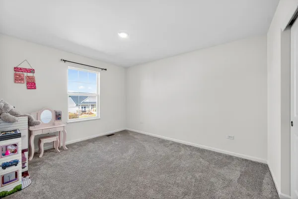 a room with furniture and a window