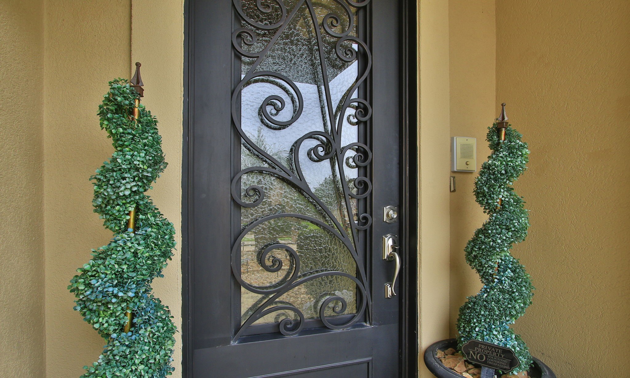 16610 Manningtree Lane Spring, TX 77379 - Photo 5 of 50 Wrought iron front door with easy open glass for cool breezes and easy cleaning.