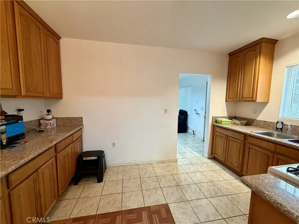 a room with furniture and a book shelf