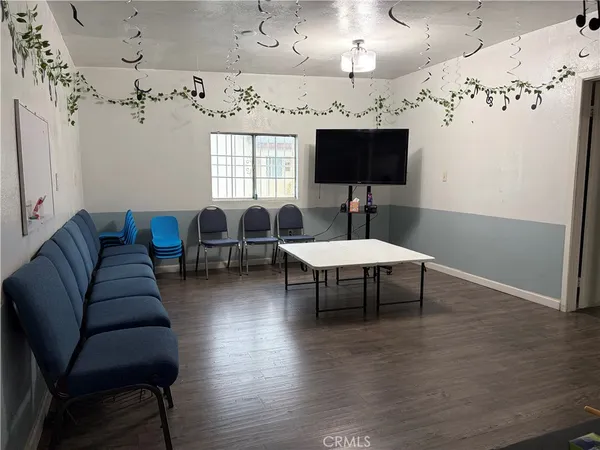 a kitchen with stainless steel appliances a stove a sink and a refrigerator