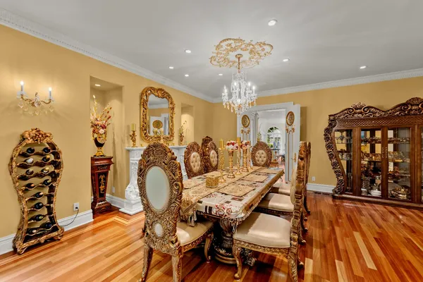 a kitchen with stainless steel appliances granite countertop a stove and a refrigerator