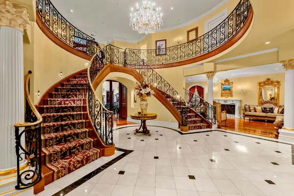 a view of a livingroom with furniture and a table