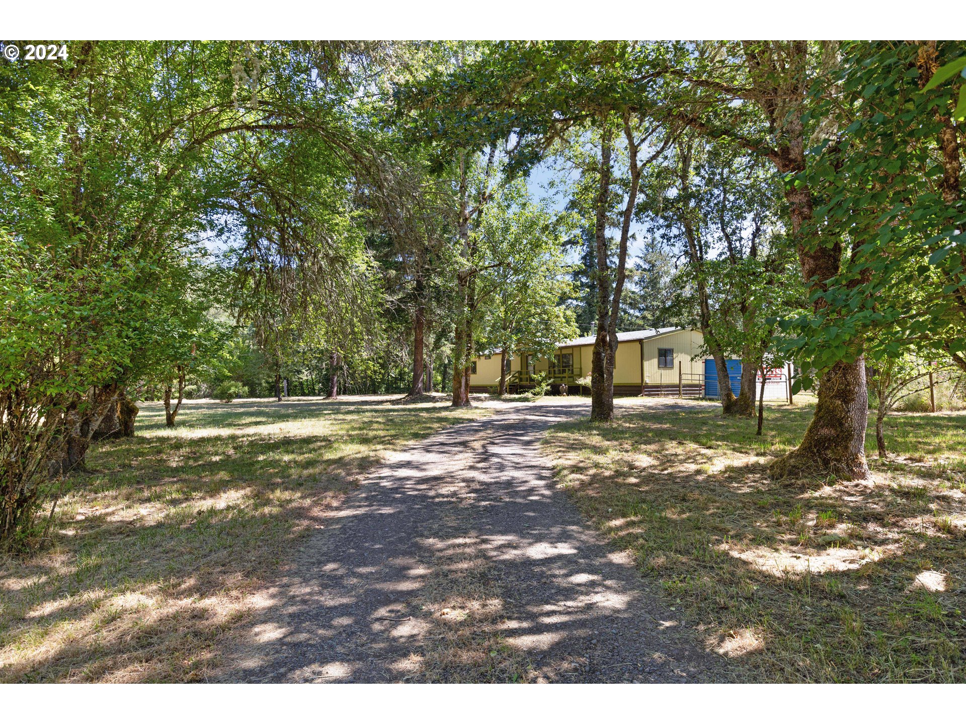 7810 Nonpareil Road Sutherlin, OR 97479 - Photo 5 of 44 a view of outdoor space with trees