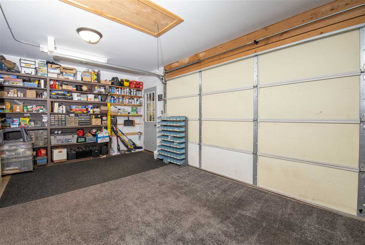 7372 North River Road Byron, IL 61010 - Photo 27 of 40 a view of a garage with storage