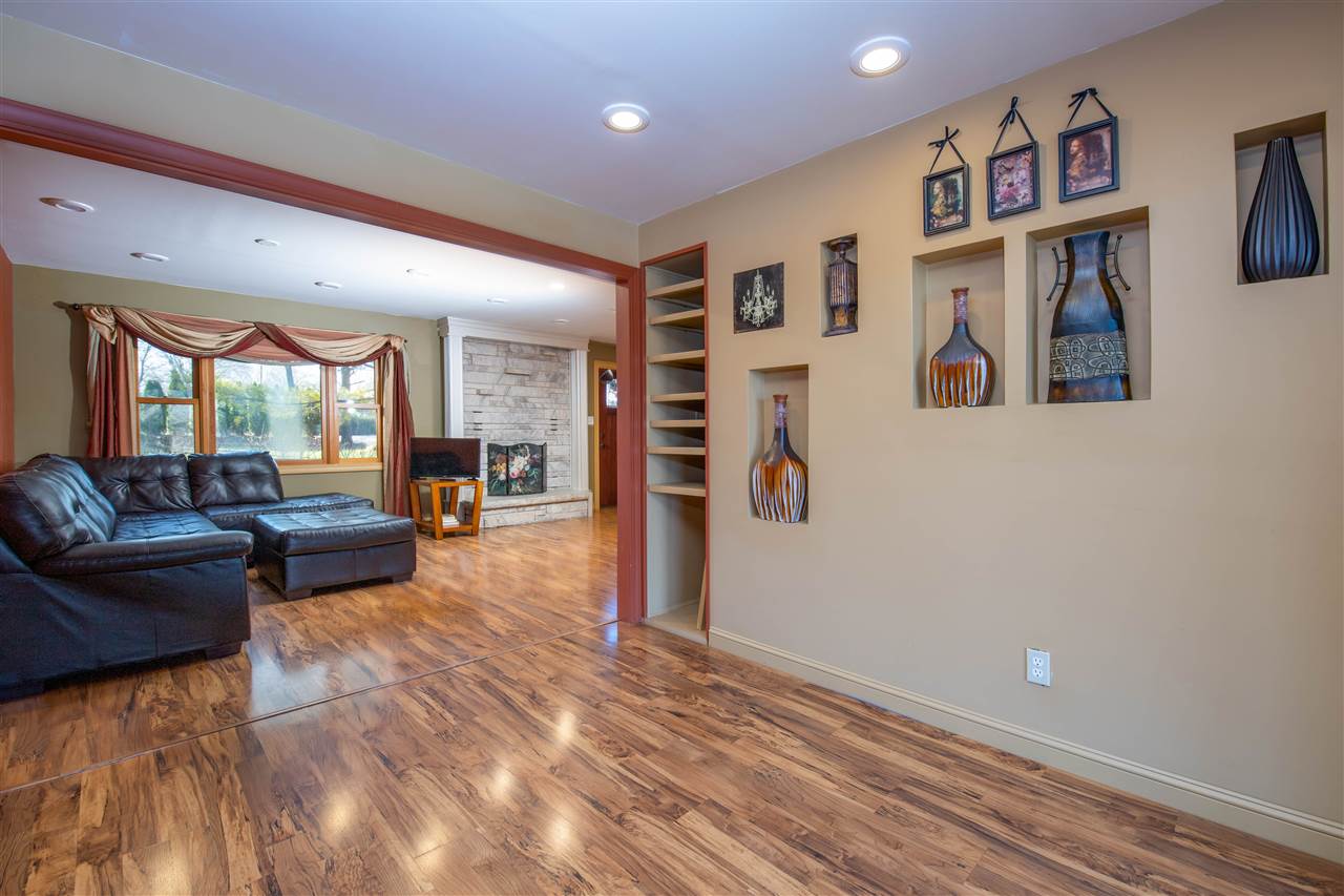7372 North River Road Byron, IL 61010 - Photo 6 of 40 a living room with furniture and large window