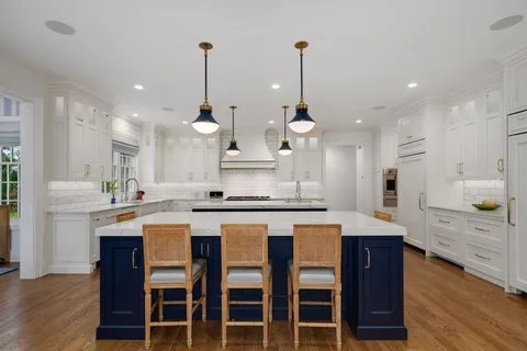 a living room with furniture and windows
