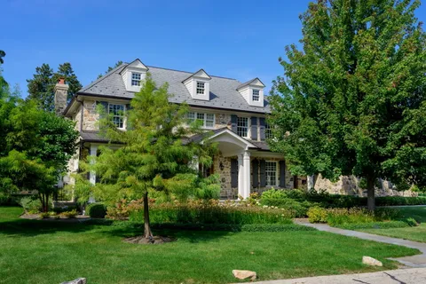 a view of a dining room with furniture and window