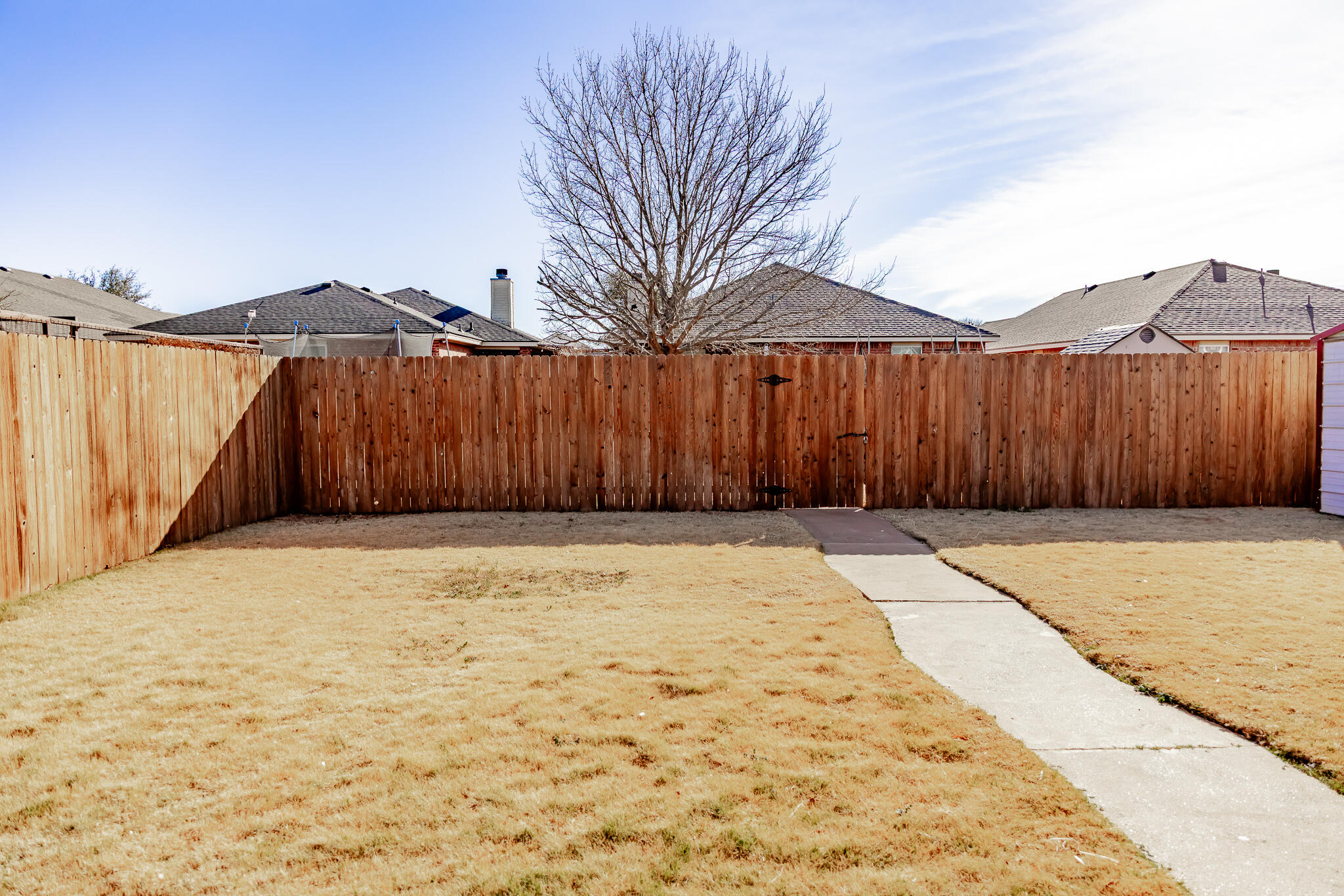 6509 87th Street Lubbock, TX 79424 - Photo 22 of 28 Stained fence