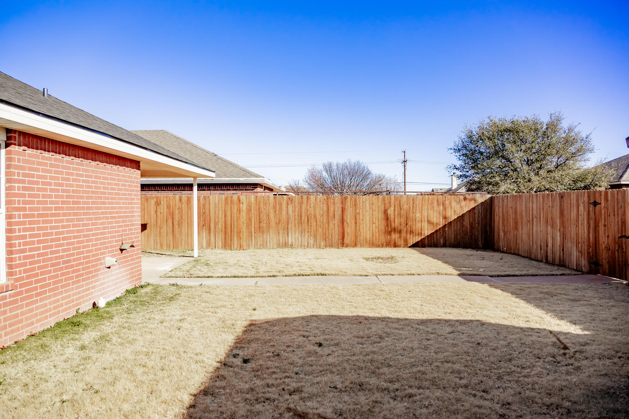 6509 87th Street Lubbock, TX 79424 - Photo 25 of 28 Sprinkler front & back