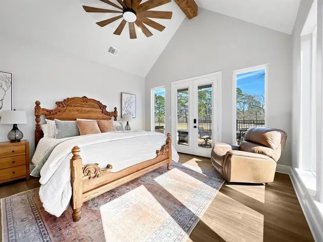 a bed room with a bed and a couch