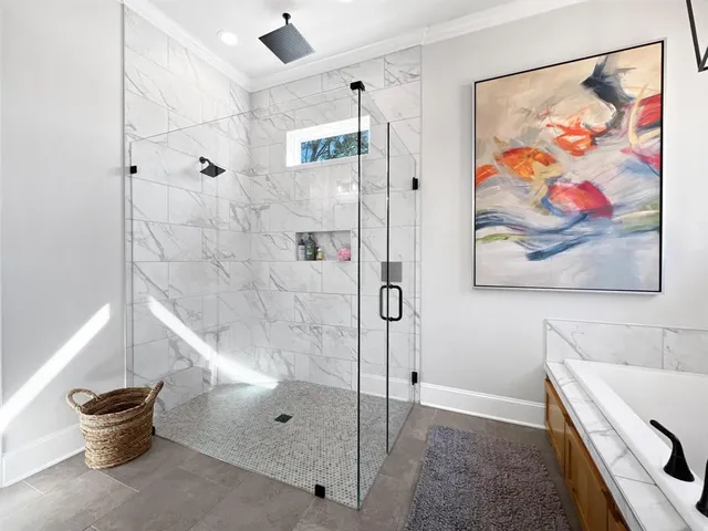 a bathroom with a shower and a toilet