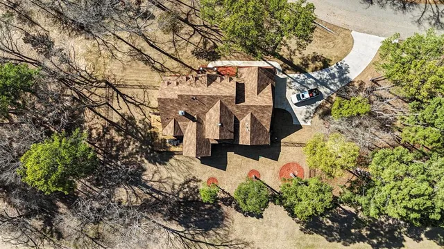 a view of a wooden fence and flowers