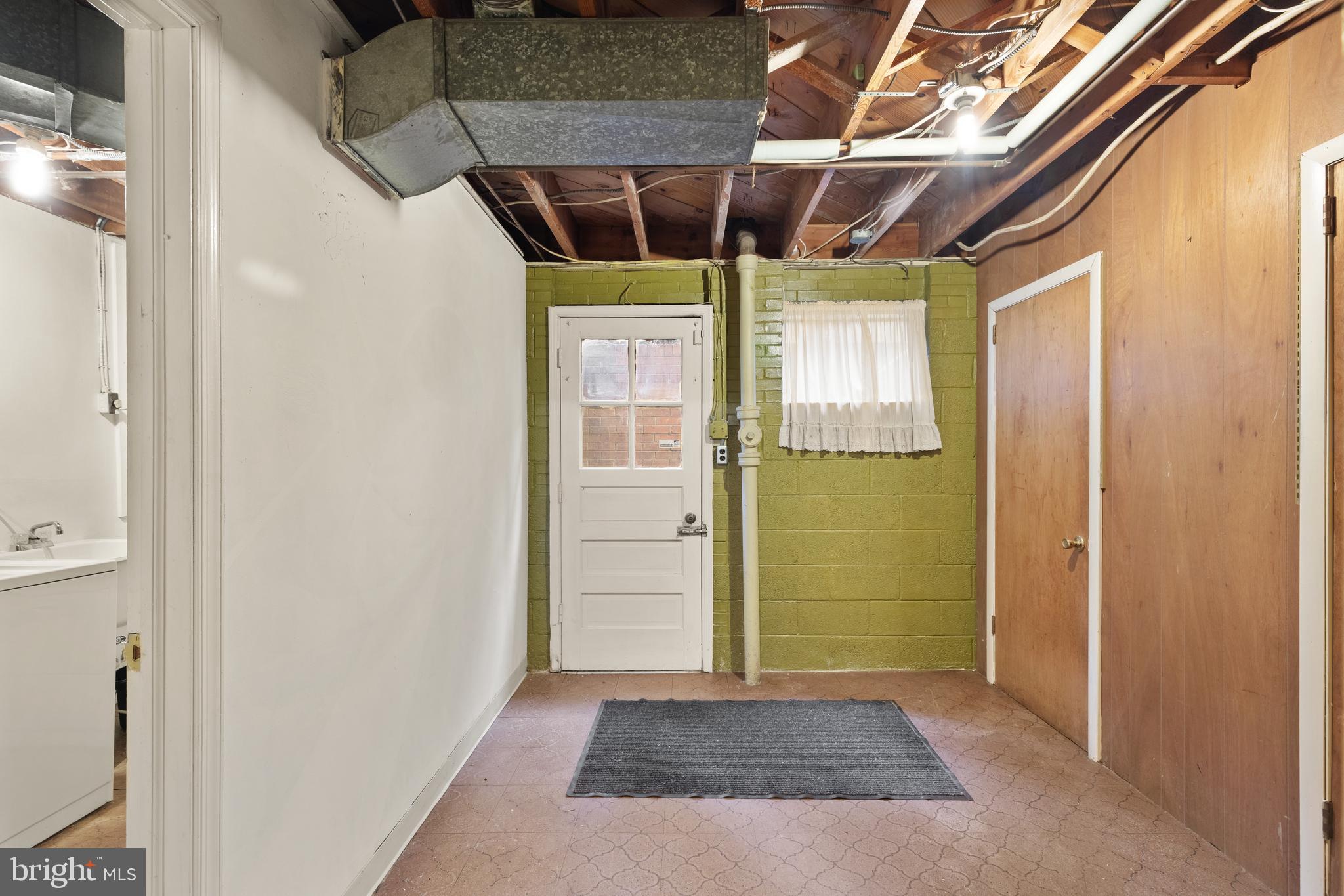 7308 Riverdale Road Lanham, MD 20706 - Photo 21 of 28 storage room with 2 cedar closets