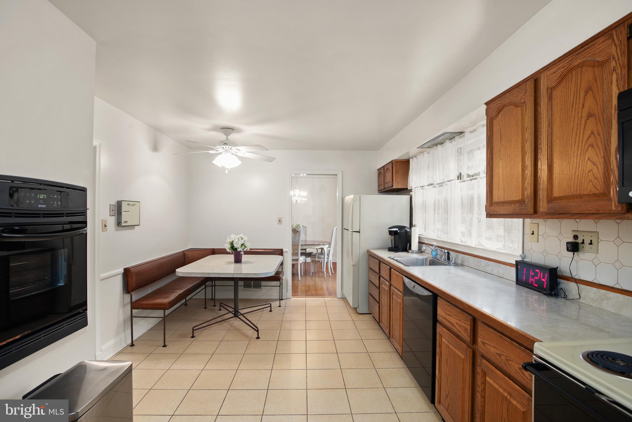 7308 Riverdale Road Lanham, MD 20706 - Photo 6 of 28 nice table sized kitchen