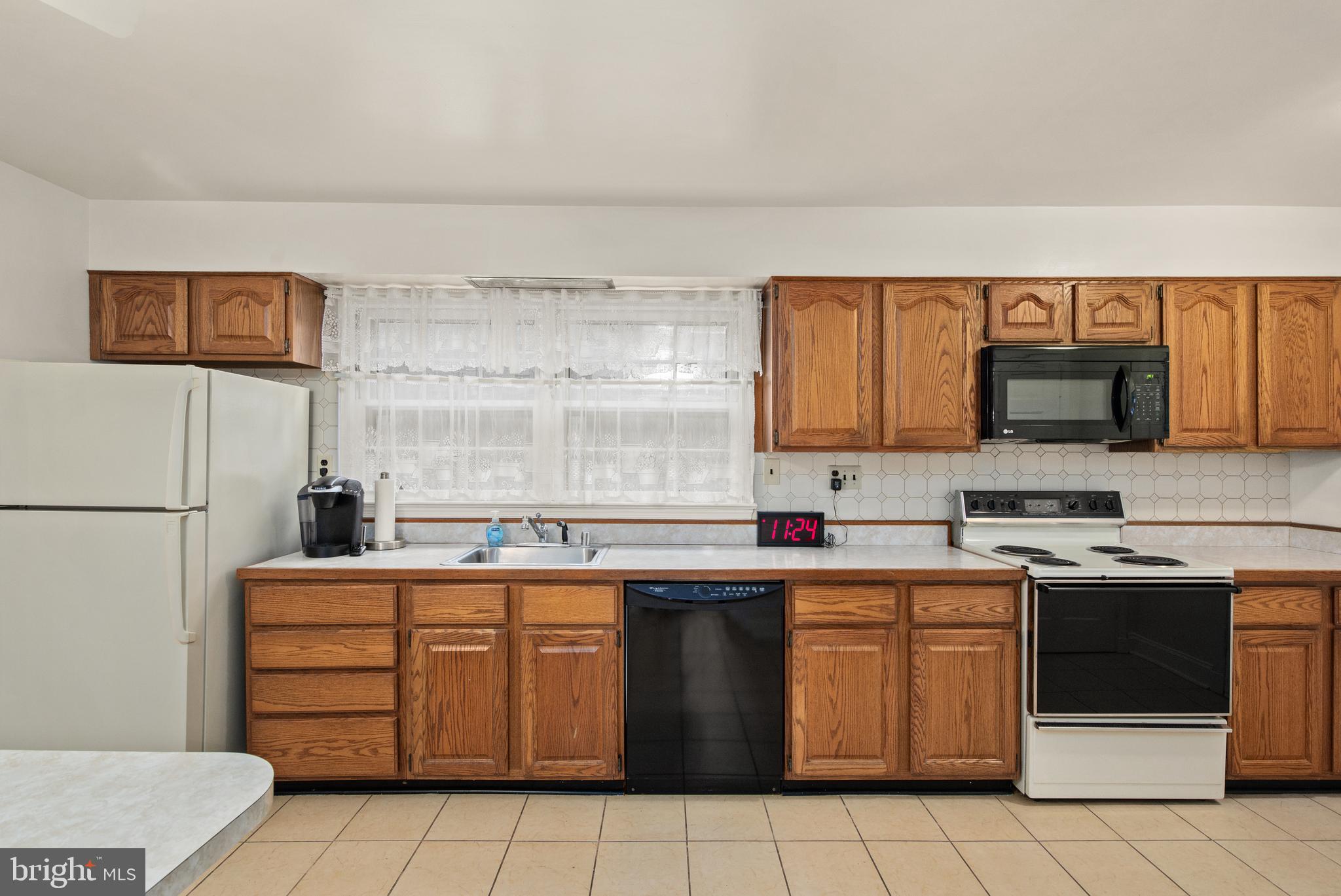7308 Riverdale Road Lanham, MD 20706 - Photo 7 of 28 kitchen with a lot of cabinet space