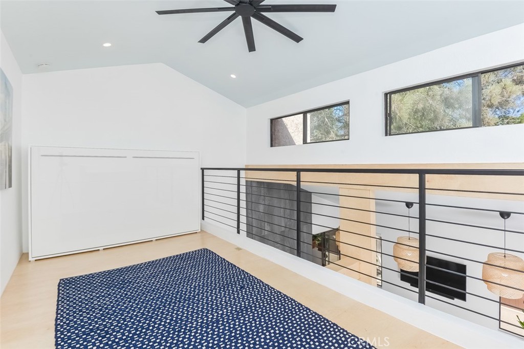 13708 Ruette Le Parc, Unit E Del Mar, CA 92014 - Photo 5 of 30 a view of a room with wooden floor