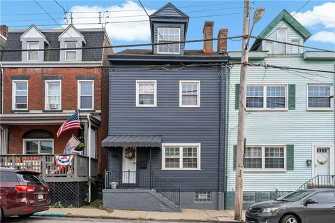 a car parked in front of a building