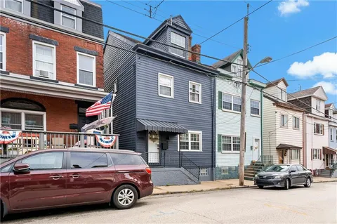 a view of a building with a street