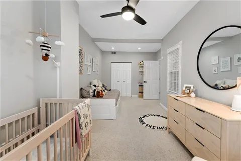a bathroom with a shower toilet and sink