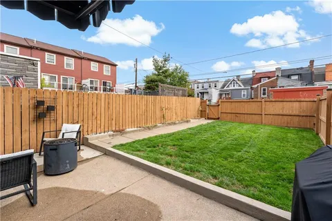 a view of a chairs and tables in the patio